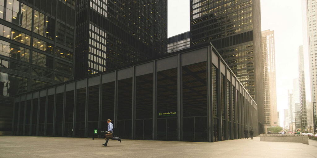 Business man running to office