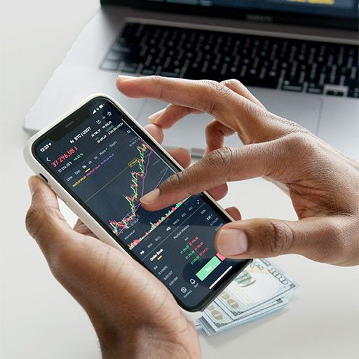 Man looking at investment charts